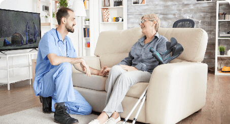 Image of Airmid Staffing carer supporting a client at home. Person-Centred Care from AirMid Staffing. Doing the little things that make all the difference in care – personal care, respite care, palliative care, live in care.